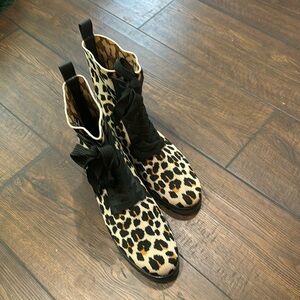 Cheetah print boots.